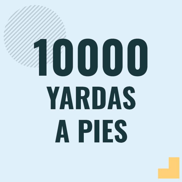 Profesor en pizarra explicando cuanto es 10000 yardas en pies o como pasar de 10000 yd a ft