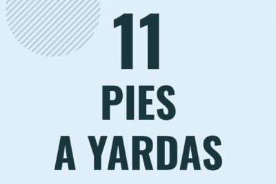 Profesor en pizarra explicando cuanto es 11 pies en yardas o como pasar de 11 ft a yd