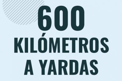 Profesor en pizarra explicando cuanto es 600 kilometros en yardas o como pasar de 600 km a yd