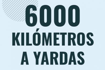 Profesor en pizarra explicando cuanto es 6000 kilometros en yardas o como pasar de 6000 km a yd