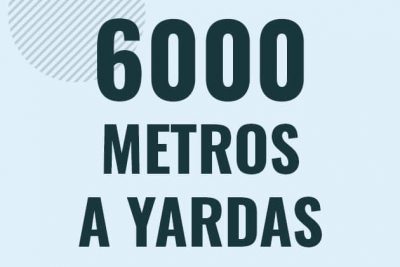 Profesor en pizarra explicando cuanto es 6000 metros en yardas o como pasar de 6000 m a yd