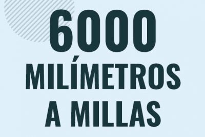 Profesor en pizarra explicando cuanto es 6000 milimetros en millas o como pasar de 6000 mm a mi