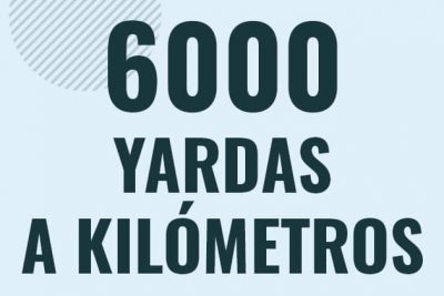 Profesor en pizarra explicando cuanto es 6000 yardas en kilometros o como pasar de 6000 yd a km