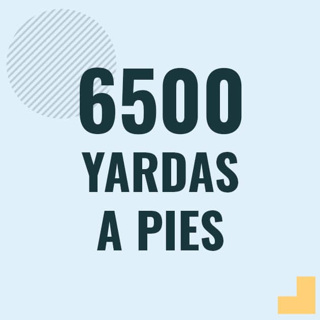 Profesor en pizarra explicando cuanto es 6500 yardas en pies o como pasar de 6500 yd a ft