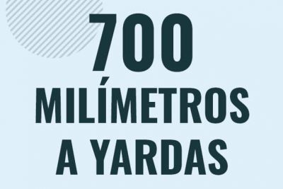 Profesor en pizarra explicando cuanto es 700 milimetros en yardas o como pasar de 700 mm a yd